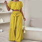 Conjunto de dos piezas para mujer: top de hombros descubiertos con mangas abullonadas y pantalones de pierna ancha – elegante, cómodo y perfecto para los días de verano ☀️
