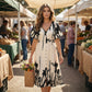 Elegante vestido midi con escote en V y estampado botánico